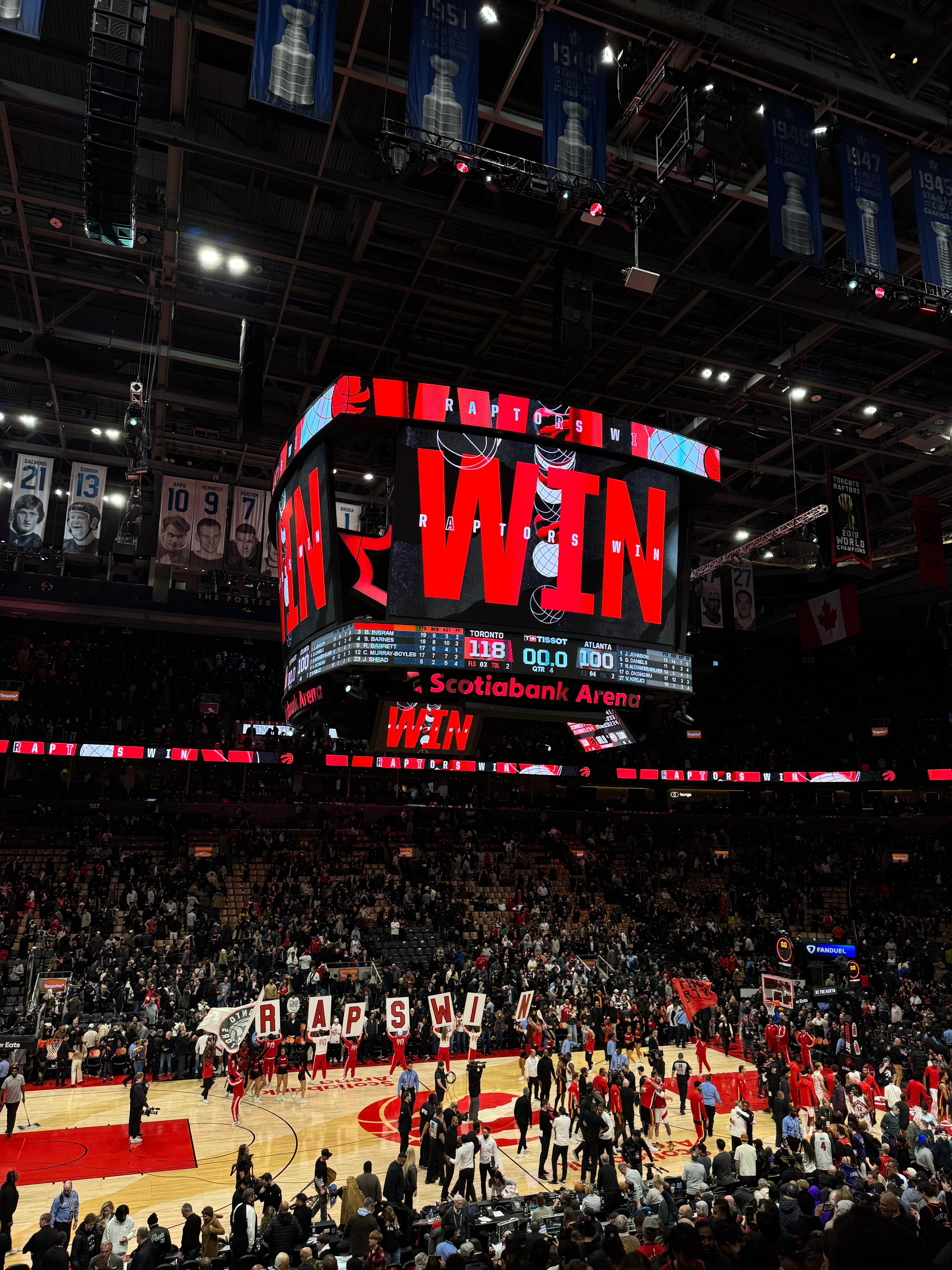 Scotiabank Arena scoreboard reading WIN after a Raptors game